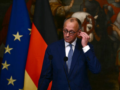 Germany's Chancellor Friedrich Merz attends a press conference at Palazzo Chigi after his